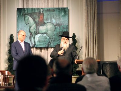 Mr. Karatnycky (left) and Chief Rabbi Yaakov Dov Bleich (right) at the book launch. 