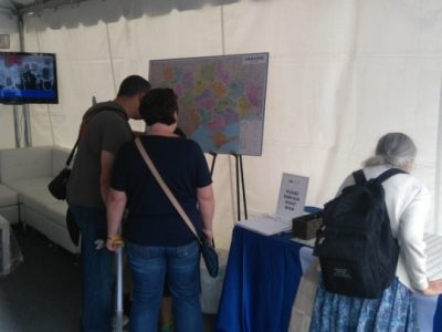 Visitors to the UJE booth