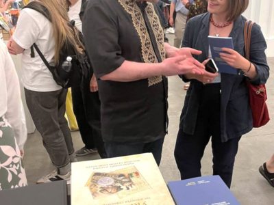 Vladyslav Hrynevych, UJE Regional Manager in Ukraine, presents the book "Ucraina Redux: Statehood and National Identity" to Iryna Slavinska, journalist, presenter, translator, curator of the main program of the 2025 Book Arsenal, 31 May 2025, Mystetskyi Arsenal National Art and Culture Museum Complex, Kyiv.