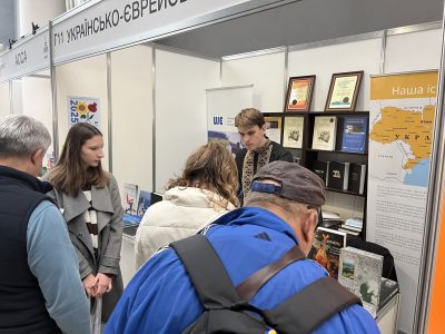 Numerous visitors at UJE's book display stand during the Book Land festival. 25–28 September 2025, Expocenter of Ukraine, Kyiv.