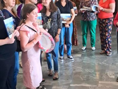 Attendees of the exhibition's opening at the Cherkasy Regional Museum of Local History with their gifts — copies of the catalog "A Journey Through the Ukrainian-Jewish Encounter: From Antiquity to 1914." Cherkasy, 11 June 2025.
