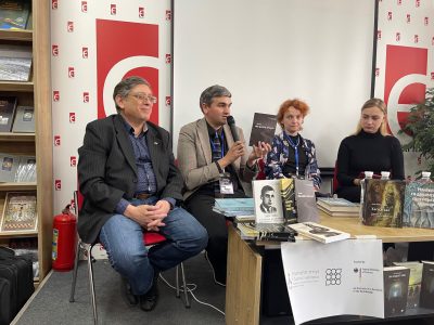 Second from left: Yehor Vradii of the Tkuma Ukrainian Institute for Holocaust Studies, Dnipro, discusses a new book published by the institute.