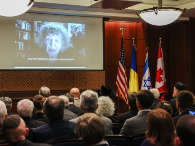 Ukrainian poet Lina Kostenko, 2025 recipient of the Andrey Sheptytsky Award, addresses the audience in a video statement. (Photo: Mo Broushaky)