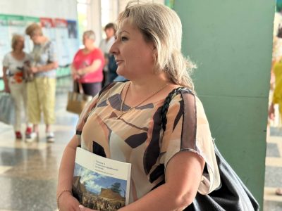 Visitors at the opening of the exhibition "A Journey Through the Ukrainian-Jewish Encounter: From Antiquity to 1939" in Smila. Smila Cultural Center, 13 July 2025.