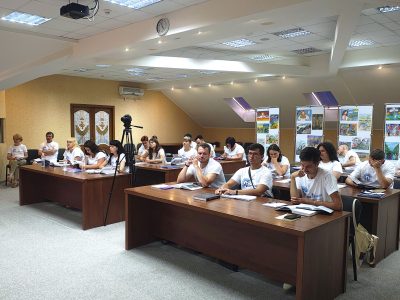 Participants of the Verba Magistri International Methodology Lab Summer School listening to the speakers at the launch of a new edition of "Babyn Yar: History and Memory". Uzhhorod, 1 August 2024.